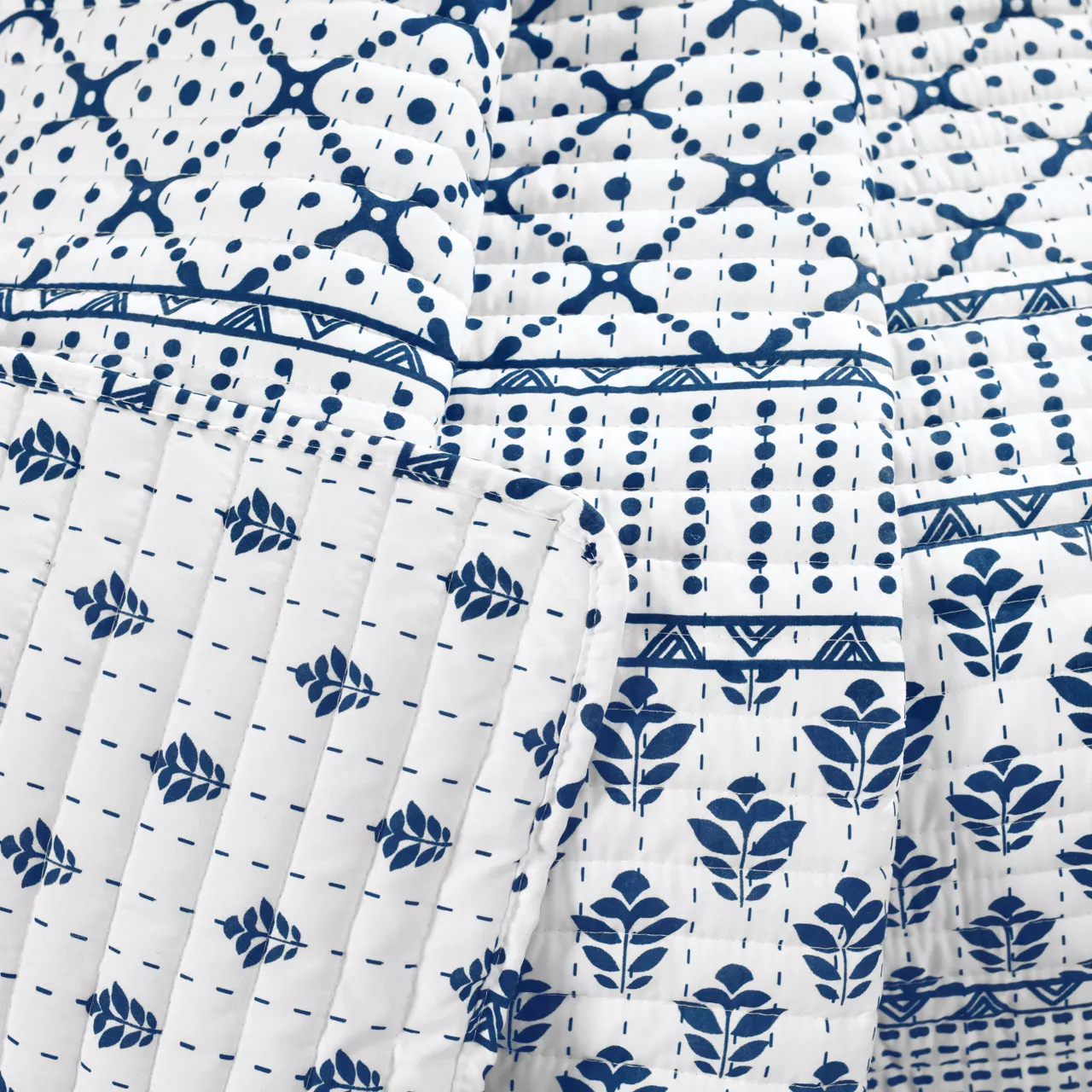 Monique White & Navy Pattern Patchwork Quilted Throw, (50" X 60") 3 Monique White & Navy Pattern Patchwork Quilted Throw, (50" X 60") - Image 3